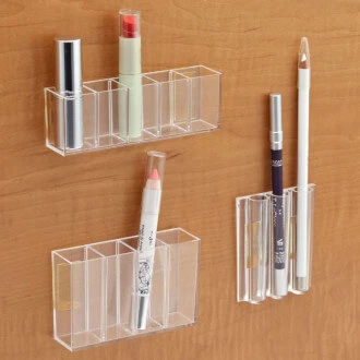 Little metal cubbies that stick on the walls